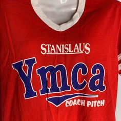 Vintage 80s YMCA Baseball T Shirt S Red V Neck Single Stitch Coach PitchExcellent conditionTag is a Youth Large, fits XS/SmallChest: 15" laying flatSleeves: 8"Length: 22" shoulder to hem50% Cotton, 50% PolyesterMade in USA Retro Red College Tops, Retro Red Tops For College, Red Retro Tops For College, Vintage Red Top With Letter Print, Vintage Red Tops With Letter Print, Vintage Red T-shirt For College, Baseball T, Baseball T Shirt, New Shop