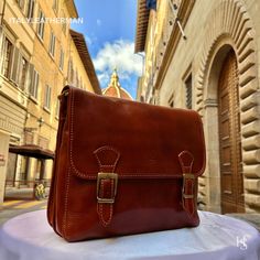 This Italian leather satchel bag is a testament to exquisite craftsmanship and timeless elegance. Handmade in Florence, Italy, using the finest genuine leather, it combines premium quality, luxury, and modern Italian fashion. Elevate your style with this meticulously crafted accessory that exudes sophistication and showcases the rich heritage of Italian craftsmanship. Experience the perfect blend of functionality and style with our Italian Handmade Leather Satchels Bags for Men. . Size: Width:32cm/12.6 inch Height:26cm/10.4 inch Depth: 10cm/4 inch  . The story of this bag: Once upon a time in the picturesque city of Florence, Italy, skilled artisans dedicated their lives to the art of leather craftsmanship. In their humble workshops, they meticulously handcrafted satchel bags with utmost p Leather Artisan, Bags For Men, Leather Satchel Bag, Mens Leather Bag, Leather Bags Handmade, Florence Italy, Satchel Bag, Leather Items, Elevate Your Style