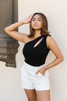 Slim fitting black one shoulder bodysuit for all your summer outfits. The black bodysuit features... Off-shoulder Bodysuit For Summer Nights Out, Summer Off-shoulder Bodysuit For Night Out, Off-shoulder Bodysuit For Night Out In Summer, Chic Off-shoulder Bodysuit For Summer, Fitted One-shoulder Bodysuit, Spring One-shoulder Party Bodysuit, Summer One-shoulder Cutout Bodysuit, Elegant One-shoulder Bodysuit For Spring, One Shoulder Bodysuit For Night Out In Spring