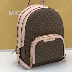 Michael Kors Jaycee Medium Backpack Brown /Pink Signature Color Backpack Logo-Print Canvas 89.4% Coated Canvas/9.6% Polyester/1% Polyurethane Trim: 60% Polyurethane /20% Polyester/20% Cotton Gold-Tone Hardware 8.75”W X 12”H X 4.25”D Exterior Details: Front Zip Pocket Interior Details: Back Zip Pocket, Tech Compartment, Front Slip Pocket Lining: 100% Polyester Zip Fastening Imported Michael Kors Backpack Medium, Pink Leather Travel Backpack With Zipper, Pink Michael Kors Backpack For Travel, Michael Kors Pink Backpack For Everyday, Pink Coated Canvas Bag With Adjustable Strap, Pink Leather Backpack With Zipper, Michael Kors Pink Travel Backpack, Korean Bags, Luxury Michael Kors Backpack For On-the-go