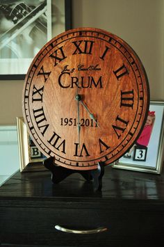 a wooden clock with roman numerals on it