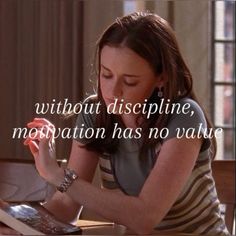 a woman sitting at a table with a laptop computer in front of her and the words without discipline, motivation has no value