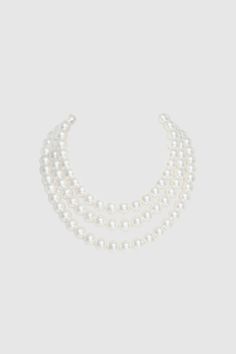 This sumptuous piece of jewelry features a retro-elegant yet slightly modern style that complements the lavish garments, reminiscent of the roaring 1920s. Features: Lustrous imitation pearls Three strand design 16.9 inch / 43cm, 18.1 inch / 46cm, 19.7 inch / 50cm long 6mm, 8mm, 10mm pearls Note: This 6mm pearl necklace is limited to GROUND SHIPPING ONLY. If expedited shipping is selected at checkout, all other items will be shipped via expedited shipping, while this item will be shipped separate Classic Pearl Necklace With Pearl Chain For Parties, Classic Pearl White Pearl Necklace For Party, Classic Pearl White Necklace For Party, Classic Pearl Necklace For Party, Classic Pearl Chain Necklace For Party, Classic Evening Pearl Necklace With Round Beads, Elegant Pearl Beaded Necklaces For Party, Classic Pearl Necklace For Evening, Classic Pearl Drop Necklaces For Party