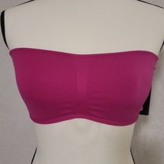 New With Tags, Never Been Worn Bright Fuchsia Seamless Bandeau By Guess. Size Medium. Pink Stretch Seamless Tube Top, Pink Stretch Bandeau Crop Top, Purple Stretch Strapless Tube Top, Pink Seamless Tube Top, Pink Seamless Strapless Tube Top, Strapless Seamless Pink Crop Top, Pink Strapless Top With Built-in Bra, Strapless Pink Top With Built-in Bra, Pink Stretch Camisole Bra