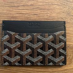 New Goyard Saintsulpice Cardholder- Classic Black Canvas/Leather Compact Wallet Brand New W/Tags - Goyard Saint-Sulpice Card Wallet - In Beautiful And Most Coveted Classic Black Harder And Harder To Get These Days. Goyard Is Limiting Their Colors And Sales Of Items. Beautiful Goyard Card Holder In Brilliant House Color Black. A Traditional Color And A Timeless Classic Piece. Goyardine Canvas And Calfskin Leather. This Is A Rare Beautiful Color! In Perfect/Mint Condition. Unworn, Unused. Negotiab Goyard Card Holder, Goyard Wallet, House Color, Compact Wallet, Card Holder Wallet, Key Card Holder, Black Canvas, Canvas Leather, Timeless Classic