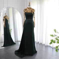 Opulent Olive: Luxury Dubai Mermaid Evening Dress with Long Sleeves for Elegant Weddings Elegant Dress With Detachable Train And Mermaid Hem, Luxury Long Sleeve Gala Gown, Luxury Long Sleeve Gown For Gala, Elegant Mermaid Dress With Detachable Train, Long Sleeve Evening Dress With Sweep Train For Banquet, Fitted Long Sleeve Evening Dress With Sweep Train, Elegant Mermaid Dress With Detachable Train For Gala, Formal Mermaid Dress With Detachable Train, Evening Long Sleeve Mermaid Dress With Fitted Bodice