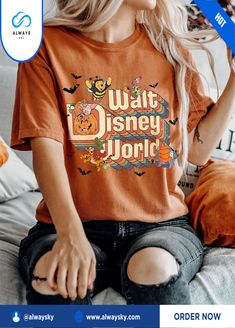 Vintage Pooh And Friends Walt Disney World Shirt, Disneyland Halloween Shirt, Disneyworld Halloween Shirt Alwaysky x Disney 2024. You may make your ensemble seem better with our amazing collection of shirts. Our shirts provide unparalleled comfort and classic style since they are crafted from premium materials. Our tailored shirts are designed to improve your looks and self-confidence, and they look great in any situation. Whether you're dressing up for a formal event or going for a more casual look, our shirts are the epitome of versatility. With our shirts, you may show off an ideal blend of sophistication and easygoing appeal, elevating your style game. #walt disney #disney world #halloween #Shirt #Alwaysky Disney Halloween T-shirt For Fan Events, Casual Mickey Mouse T-shirt For Fall, Fall Disney Character Print Tops, Disney Character Print Tops For Fall, Mickey Mouse T-shirt For Disney Fan Events In Fall, Disney Crew Neck Top For Halloween, Disney Halloween Cotton T-shirt, Disney Halloween Short Sleeve Tops, Disney Letter Print Top For Fall