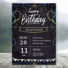 a black birthday card with the words happy birthday on it and confetti sprinkles