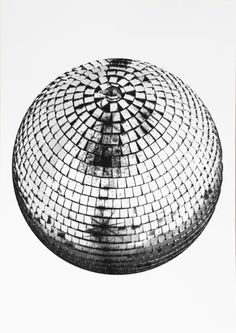 a black and white photo of a large object with many squares on it's surface