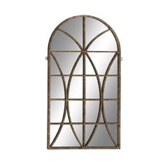 an arched window with metal bars on the sides and mirrors above it, against a white background