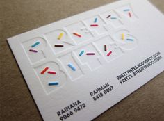 a business card with sprinkles on it