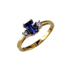 Royal 14K Yellow Gold Tanzanite & Diamond Halo Ring - 0.64 Carat Tanzanite, 0.08 Carat Diamond Tanzanite Diamond Ring, Tanzanite Stone, Diamond Halo Ring, Tanzanite Diamond, Royal Jewelry, Halo Diamond Ring, Emerald Cut Diamonds, Halo Ring, Diamond Halo