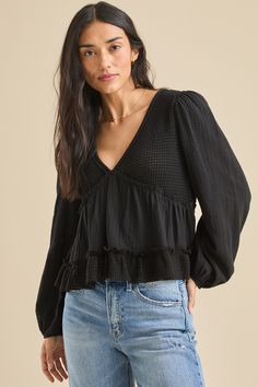 This mixed gauze material babydoll top, offers a cozy yet stylish addition to your everyday wardrobe. With its airy texture and relaxed silhouette, it's perfect for effortless layering or standalone chic.