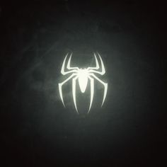 the spider logo is glowing in the dark