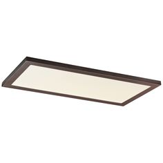 a ceiling light that is on top of a white wall and has a brown frame