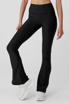 It’s our sleekest signature fabric in cut of the moment — bootcut! The Airlift High-Waist Game Changer Legging has landed, with forward flares, a high waist and snaps down the sides. Effortlessly tie your studio-to-street look together by pairing it with a cropped coverup. Smoothing, second skin feel & cool side snaps Forward bootcut fit & wide waistband Designed & uniquely fit to flatter every size Wear-tested by our in-house team for the perfect fit Boot Cut Leggings, Womens Black Pants, Alo Yoga Pants, Flare Leggings, Alo Yoga, Wide Waistband, Yoga Wear, Yoga Women, Game Changer