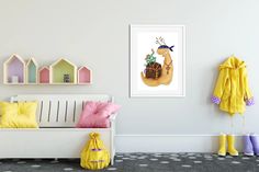 a white bench sitting in a room next to a wall with some colorful items on it