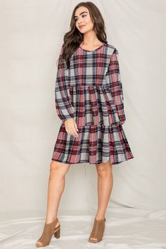 Made in the USA 95% Polyester 5% Spandex Elastic waistband, long sleeves with elastic, tiered skirt Size: 1X(18), 2X(20), 3X(22) 1X: Bust 44" Length 38" 2X: Bust 46" Length 38.5" 3X: Bust 48" Length 39" Long Sleeve Plaid Dress With Ruffle Hem, Casual Long Sleeve Tiered Dress With Ruffles, Red Long Sleeve Dress With Ruffle Hem, Red Tiered Dress For Fall, Fall Long Sleeve Dresses With Ruffle Hem, Long Sleeve Ruffle Hem Fall Dresses, Long Sleeve Ruffle Hem Dresses For Fall, Long Sleeve Dresses With Ruffle Hem For Fall, Casual Tiered Dress For Fall