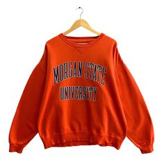 "Code : p/534 Vintage 90s Morgan State University Orange Sweatshirt Baggy Large Morgan State Crewneck Morgan State University Print Logo University Jumper Size on Tag : L Details Measurement  Arm Pit to Arm Pit : 27\"inches Back Collar to Hem : 27\"inches Condition :  Great Vintage Condition.❌NO HOLES AND NO STAIN❌.Please refer pictures detail.‼️" Oversized Vintage Sweater With Letter Print, 90s Oversized Tops For College, Oversized 90s Letter Print Sweatshirt, 90s Oversized Sweatshirt With Letter Print, Vintage Crew Neck Tops For Campus, Vintage Sweatshirt With Letter Print For Campus, Vintage Long Sleeve Tops For Campus, Vintage Relaxed Fit Letter Print Sweater, Vintage Relaxed Fit Sweater With Letter Print