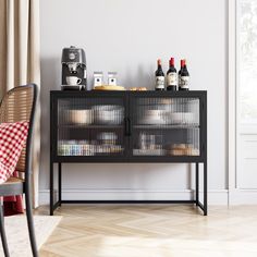 a black cabinet with wine bottles on it