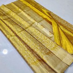 Join our Whatsapp Community Group for latest updates- https://chat.whatsapp.com/GzJvkK4gnwNDuVyX7GrVh4  Visit www.silktatva.com for extra discounts Gold Kanchipuram/Kanjivaram Handloom Floral Edge to Edge Gold and Silver Zari Bridal Pure Silk Saree Beautiful saree with all over Gold and Silver Zari brocade weaving in the body of the saree in traditional floral design Heavy Pallu with full Zari weaving This saree is woven from pure mulberry silk thread. Truly a Masterpiece for your Saree collecti Tissue Silk Saree, Party Sarees, Tissue Saree, Pure Silk Saree, Exclusive Wedding, Traditional Sarees, Pure Silk Sarees, Beautiful Saree, Silk Thread