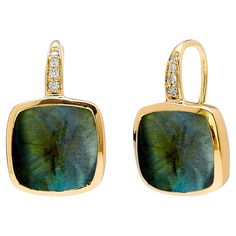 Created in 18 karat yellow gold Labradorite 8 carats approx. Diamonds 0.05 carat approx. French wire for pierced ears Limited edition Composed in 18 karat golden hue, these limited edition earrings comprise 8 carats of labradorite and around 0.05 carats of diamonds, adorning French wire fittings for pierced ears. About the Designers ~ Dharmesh & Namrata Drawing inspiration from little things, Dharmesh & Namrata Kothari have created an extraordinary and refreshing collection of luxurious jewels. True believers of destiny, they always feel that the possibilities of design - and life - are limitless when people work together. Formed in 2003, Syna Jewels has grown through enduring relationships with well known, established companies and have evolved by creating many successful collections. Sta People Working Together, Contemporary Earrings, Yellow Gold Earrings, French Wire, Yellow Gold Earring, Pierced Ears, Drawing Inspiration, Ear Piercings, Labradorite