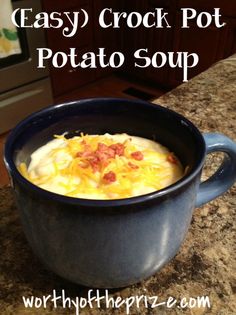 an easy crock pot potato soup in a blue bowl