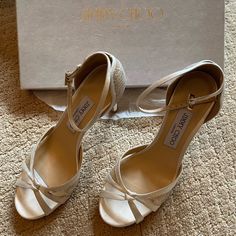 Never Worn Gorgeous Jimmy Choo Heels! Size 37. Bought The Wrong Size And Waited Too Long To Return. Ivory/ White Color. Cream Fitted Wedding Shoes With Heel Strap, Fitted Cream Wedding Shoes With Heel Strap, Luxury Cream Open Toe Wedding Shoes, Classic Cream Almond Toe Wedding Shoes, Classic Beige Heels For Wedding, Classic Beige Wedding Heels, Ivory White Color, Basic Girl, Jimmy Choo Heels