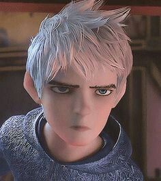 an animated image of a man with short hair and blue eyes, wearing a sweater