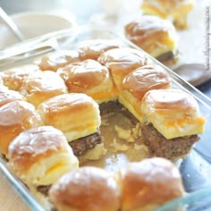 mini hamburger sliders in a glass baking dish