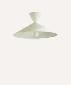 a white ceiling light hanging from the ceiling