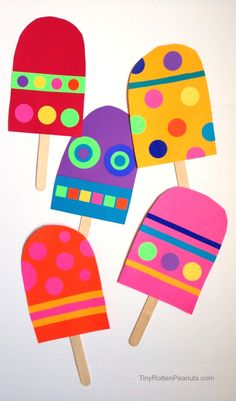 popsicles made out of paper and decorated with polka dots