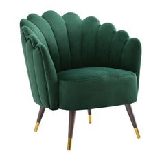 a green velvet chair with gold legs