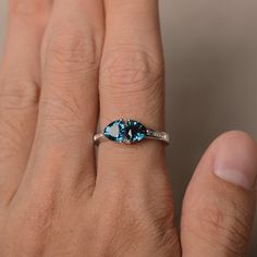 This is a gorgeous handmade creation. Its beauty is its simplicity & Elegance. The 6*6 mm trillion cut faceted real blue topaz is crafted in solid sterling silver and with rhodium plated. All item is sent in a beautiful gift box If you have any idea of design your ring,pls contact me directly. You can realize more lovely stuff clicking the link https://www.etsy.com/shop/knightjewelry?refshopsection_shophome_leftnav Please leave the correct address and you phone number for delivering successf Blue Trillion Cut Sterling Silver Ring, Sapphire Topaz Ring With Diamond Cut In Sterling Silver, Sterling Silver Sapphire Topaz Ring With Diamond Cut, Blue Topaz Trillion Cut Ring, Blue Trillion-cut Topaz Ring, Blue Trillion Cut Topaz Ring, Sapphire-colored Blue Topaz Promise Ring, Blue Topaz Trillion Cut Ring Gift, Blue Trillion Cut Rings For Gift