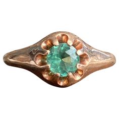 Details: Very pretty vintage rose gold solitaire ring with a bright blue green tourmaline. Simple 14K rose gold with a raised prong set stone, this ring has a very classic sweet look! The green in the stone is green with a subtle blue cast—think of tropical ocean waters! Super pretty color! This ring has no interior markings, but the gold has been tested and is 14K. This is a very pretty ring—you will not be disappointed! Please ask all necessary questions prior to placing an order. Measurements Rose Gold Solitaire Ring, Tropical Ocean, Pretty Ring, Vintage Rose Gold, Gold Solitaire Ring, Pretty Rings, Vintage Rose, Green Tourmaline, Vintage Roses