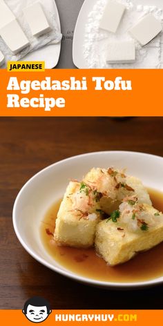 japanese tofu recipe on a plate with chopsticks and sauce in the background