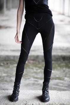 Fitted Punk Leggings For Cosplay, Fitted Rave Bottoms For Alternative Fashion, Gothic Black Leggings For Streetwear, Black Edgy Leggings For Streetwear, Punk Style Fitted Leggings For Streetwear, Black Stretch Leggings For Cosplay, Edgy Black Leggings For Alternative Fashion, Black Punk Leggings For Streetwear, Edgy Stretch Leggings