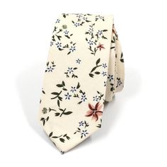 Floral Desert Cream Tie - Art of The Gentleman Fitted Cotton Tie, Dapper Cotton Ties For Formal Occasions, Dapper Cotton Ties For Business, Dapper Cotton Tie For Formal Occasions, Formal Cotton Tie, Formal Dapper Cotton Ties, Spring Business Cotton Suit And Tie Accessories, Elegant Cotton Ties For Spring, Cotton Ties For Workwear In Spring