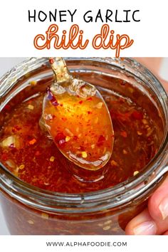 honey garlic chili dip in a glass jar with a spoon full of it and text overlay