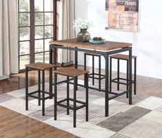 three stools and a table in a room