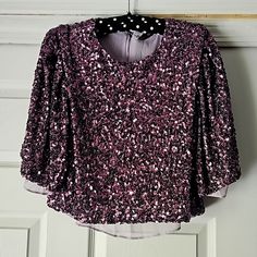 Gorgeous Sequined Top, Design By Endless Rose__ *Features Scoop-Neckline, Sheer Gauze Lining, Short Flutter Sleeves With Soft Pleating At The Shoulder Top, And Sequins All Over! *Size Xs, Relaxed-Fit, Eggplant Purple Color With Lavender Colored Lining *100% Polyester, Exclusive Of Sequins. Made In China. *Brand-New With Original Tags On. *Contemporary Style, Perfect Over-Layer For A Simple Gown Or Dress, Works Well With High Waist Palazzo Pants, Appropriate For Wedding/Formal Wear. Reach Out With Your Best Offer! Pink Short Sleeve Top For Evening, Elegant Short Sleeve Crop Top For Party, Elegant Short Sleeve Party Crop Top, Purple V-neck Top For Evening, Glamorous Pink Blouse For Night Out, Pink Evening Tops For Party Season, Pink Tops For Evening Party Season, Fitted Purple Blouse For Party, Glamorous Purple Sequin Top