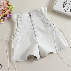 SPECIFICATIONSWomen Tie PU Shorts: High Waist A-Line ShortsWomen All Match Shorts: Black Casual ShortsWaist Type: HIGHStyle: Fashion,Slim,Casual,LooseStyle: CasualSeason: Spring,Summer,AutumnPattern Type: SolidPant Style: RegularOrigin: CN(Origin)Model Number: Women Shorts AB1170Material Composition: PUMaterial: PUMaterial: PolyesterItem Type: ShortsGender: WOMENFit Type: RegularClosure Type: Zipper FlyBrand Name: SexeMara Short Cuir, Leather Shorts Women, Celana Fashion, Y2k Girls, Short Blanc, Short Noir, Black Leather Shorts, Wide Leg Shorts, Black High Waisted Shorts