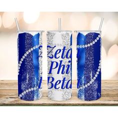 two blue and white soda cans with the words selt ph beta on them