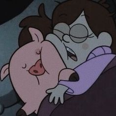 two cartoon characters hugging each other in front of a tv screen with the caption's name on it