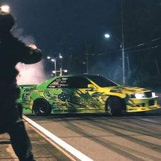 Tokyo Drift Pfp, Car Racer Aesthetic, Aesthetic Car Wallpaper, Car Pfp, Cars Quotes, Wallpapers Cars, Car Stunt, Cars Tattoo, Car Aesthetics