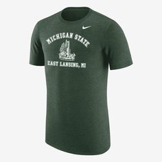 The Michigan State T-shirt delivers comfort while boasting your school loyalty. A soft blend of fabric will make this your next go-to layer as you cheer on the Spartans. Nike Crew Neck T-shirt For College, Collegiate T-shirt For College Events With Team Name, Nike College Fan Apparel T-shirt, University Logo Cotton T-shirt For College Events, Sporty Crew Neck T-shirt For College Events, Nike Collegiate T-shirt For Sports, Nike Collegiate T-shirt For Sports Season, Collegiate Green T-shirt With Logo Print, Nike Casual T-shirt For Fans