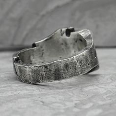 Project50g | Cascade ring- asymmetrical brutalist signet ring with solid silver texture – project50g Brutalist Style Open Ring Jewelry, Brutalist Hand Cast Open Ring, Brutalist Oxidized Open Ring, Brutalist Sterling Silver Signet Ring, Silver Brutalist Hammered Ring, Brutalist Hammered Silver Ring, Brutalist Silver Hand Cast Rings, Silver Brutalist Hand-cast Rings, Silver Texture