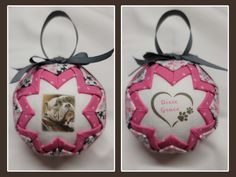 a pink ornament with a dog's photo on the front and back