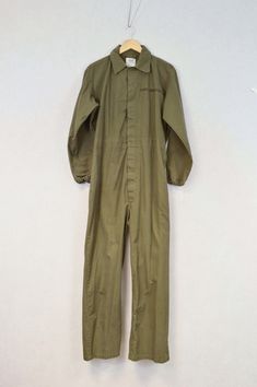 "Unisex Vintage Overalls Boiler Suit Coveralls Khaki Army Green - M L XL Fantastic cotton vintage fatigue utility workwear jumpsuits. Made for men but can be worn by women. - Tough overalls made for the military - built to last - Made from a quality cotton fabric - Velcro front fastening - Elasticated back for a comfortable fit - Ideal for many projects: industry personnel, technicians, mechanics, DIY jobs or fashion - Classic khaki olive green fatigue colourway - Better quality than modern equi Khaki Utility Overalls For Workwear, Vintage Denim Overalls For Work, Khaki Utility Overall Jumpsuits And Rompers, Khaki Cotton Long Sleeve Jumpsuits And Rompers, Vintage Cotton Jumpsuits And Rompers For Work, Utility Cotton Khaki Jumpsuits And Rompers, Green Utility Overalls For Workwear, Khaki Utility Jumpsuits And Rompers, Green Workwear Overalls