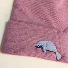 Manatee embroidered beanie hat. ✨ Embroidered Manatee Beanie Hat. Double layer knit. ✨ Cuffed design with manatee embroidered. Manatee Embroidery, Life In Water, Pokemon Jewelry, Sea Cow, Majestic Creatures, Embroidered Beanie, British Wildlife, Air Force Blue, Recyclable Packaging